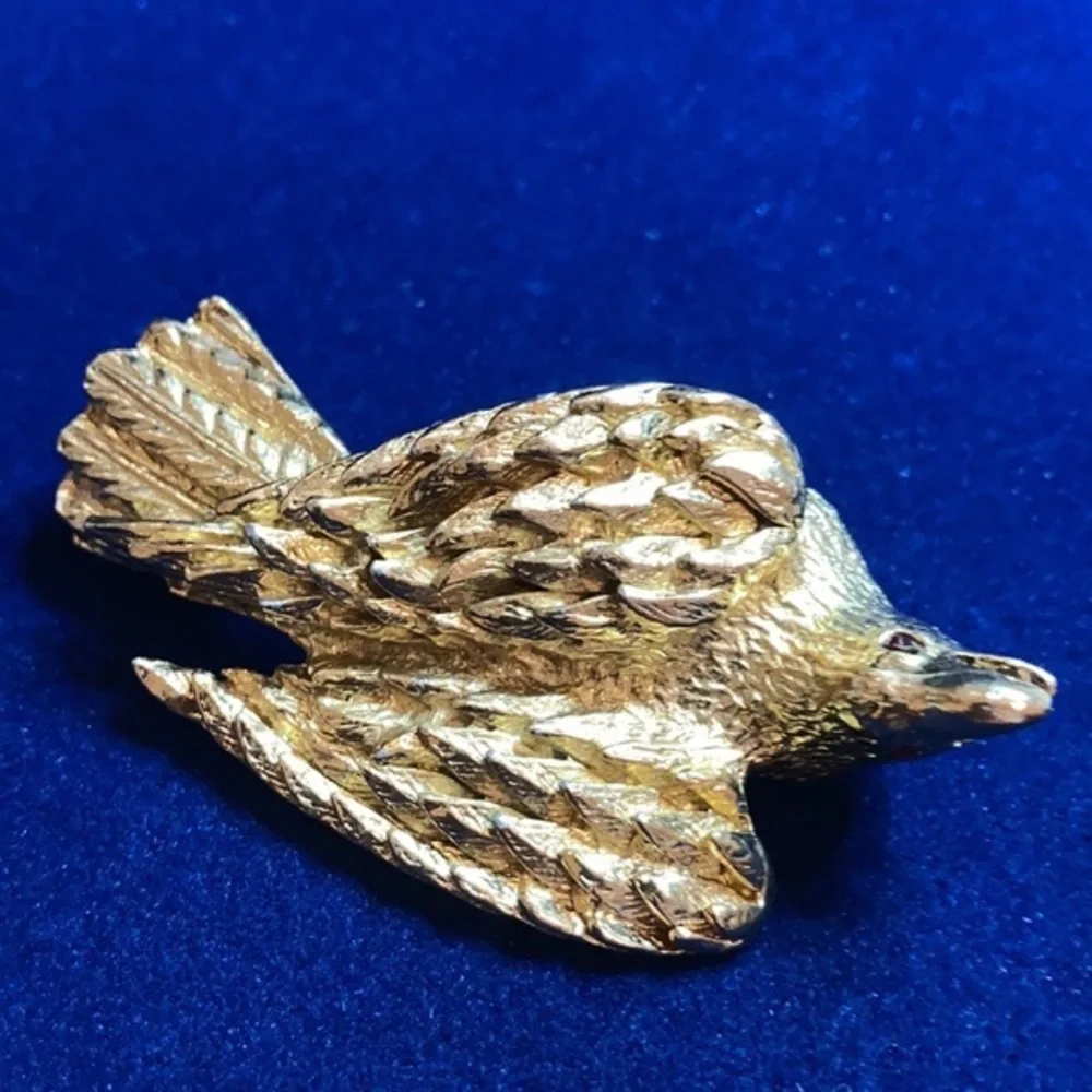 Vintage ‘60s gold tone Nesting eagle with red rhinestones